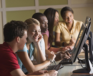 image of students with computers